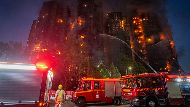 At least 36 dead and hundreds missing in Hong Kong buildings blaze