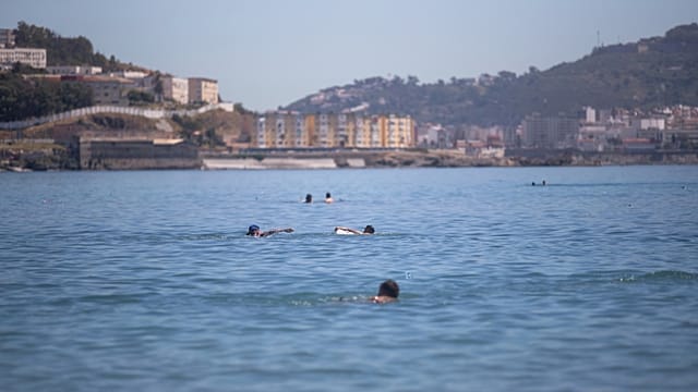 Hundreds of migrants swim from Morocco to the Spanish territory of Ceuta