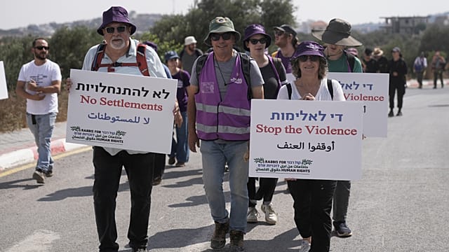 Activists attempt to deliver supplies to besieged Palestinian families