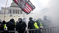 Police hold off Trump supporters who tried to break through a police barrier, Wednesday, Jan. 6, 2021, at the Capitol in Washington.