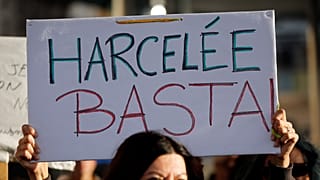 A placard is held during a protest against sexual violence in Marseille