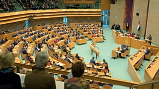 Man injured after jumping from public gallery of Dutch parliament
