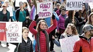 Thousands around the world protest for stronger US gun laws