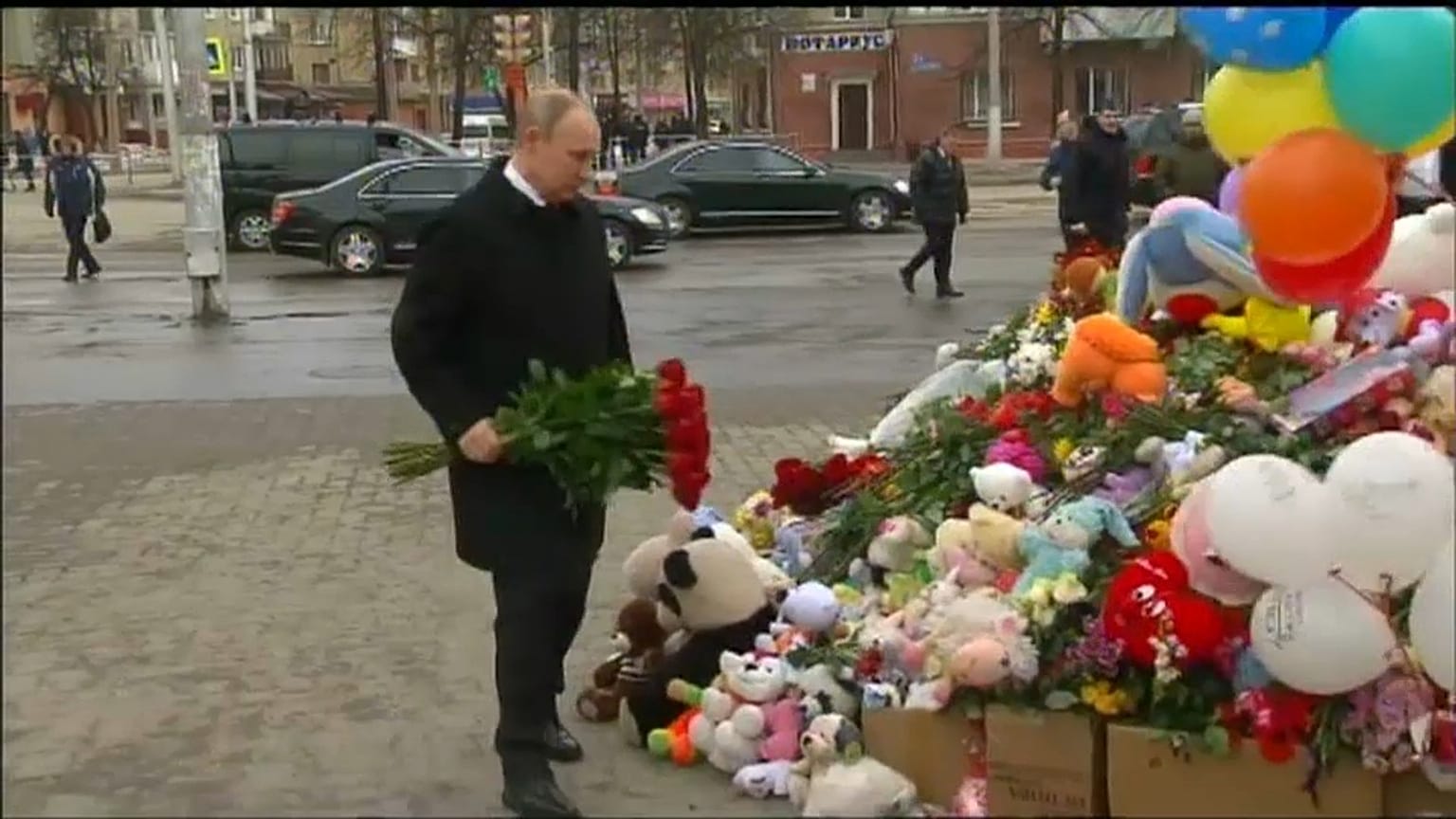 Vladimir Putin visits scene of Siberian shopping mall fire