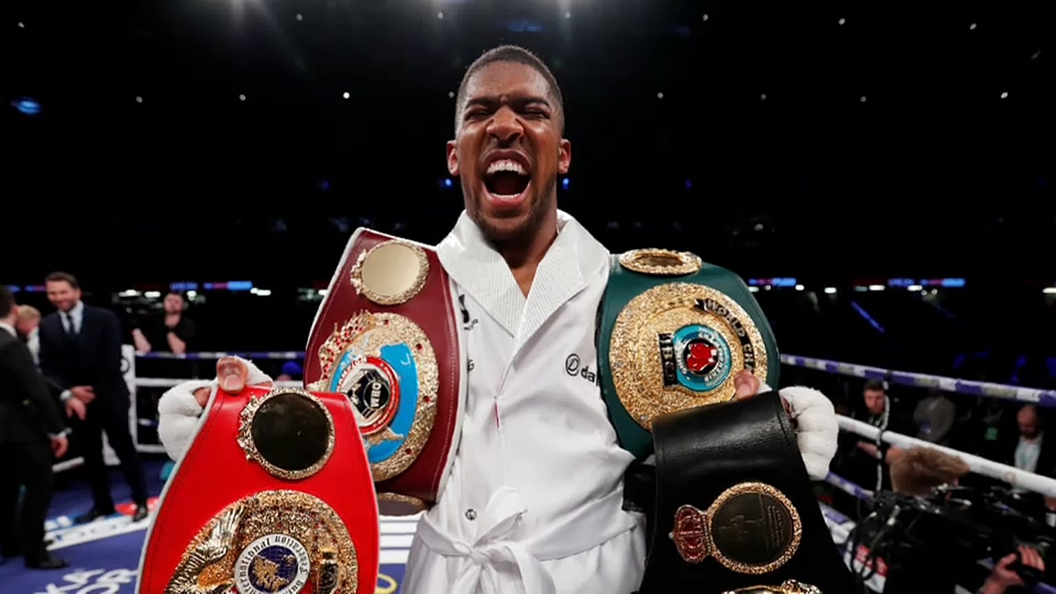 Britain's Anthony Joseph celebrates victory over Joseph Parker