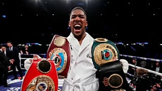 Britain's Anthony Joseph celebrates victory over Joseph Parker