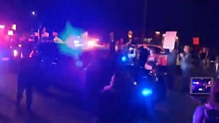 Polizeiauto fährt 61-jährige Demonstrantin an