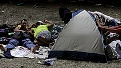 Honduran migrants in the caravan on a journey to US
