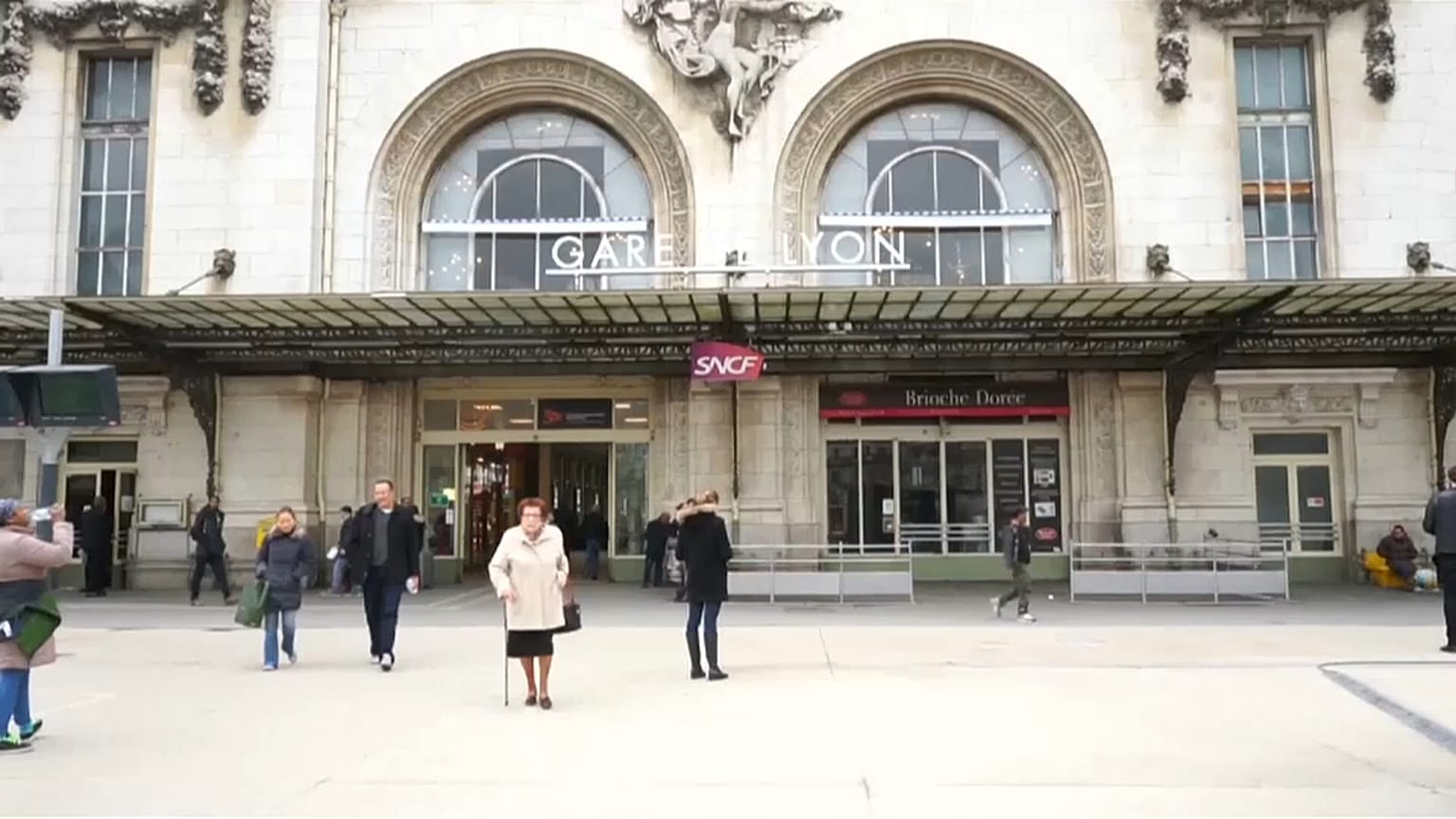 Paris suburban line passengers enter train through windows