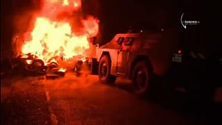 Armoured cars were sent to remove barricades blocking access to the camp