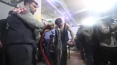 Civilians in the aftermath of the alleged chemical attack in Douma