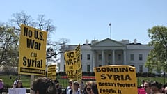 Watch: Protests against Syria air strikes take place outside White House