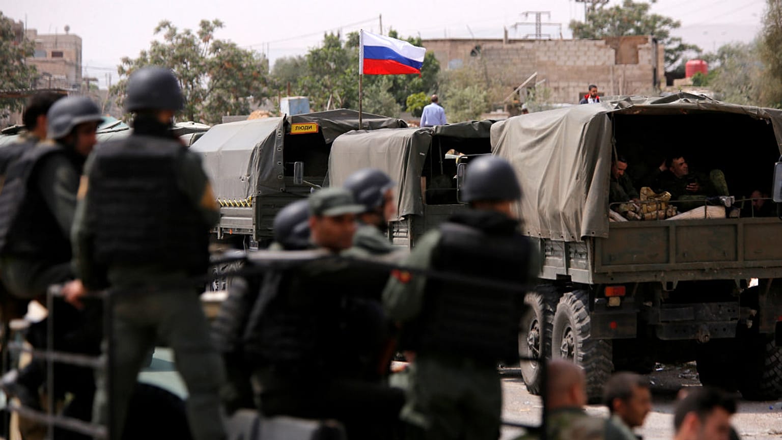 Russian flag is seen on military vehicle at entrance of Wafideen camp in Da