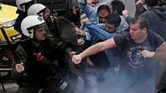 Clashes erupt as protesters try to topple Truman statue in Athens