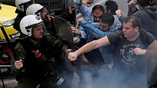 Clashes erupt as protesters try to topple Truman statue in Athens