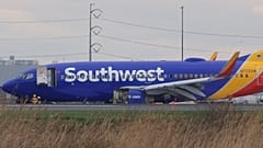 Woman dies after being 'sucked out' of US passenger plane as engine blows