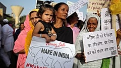 Women protest against recent cases of child rapes in India