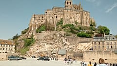 Security cars are seen in Mont Saint-Michel