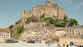Security cars are seen in Mont Saint-Michel