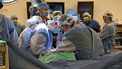 Doctors conduct the operation