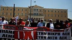 Workers in front of the parliament building in Athens, Greece.