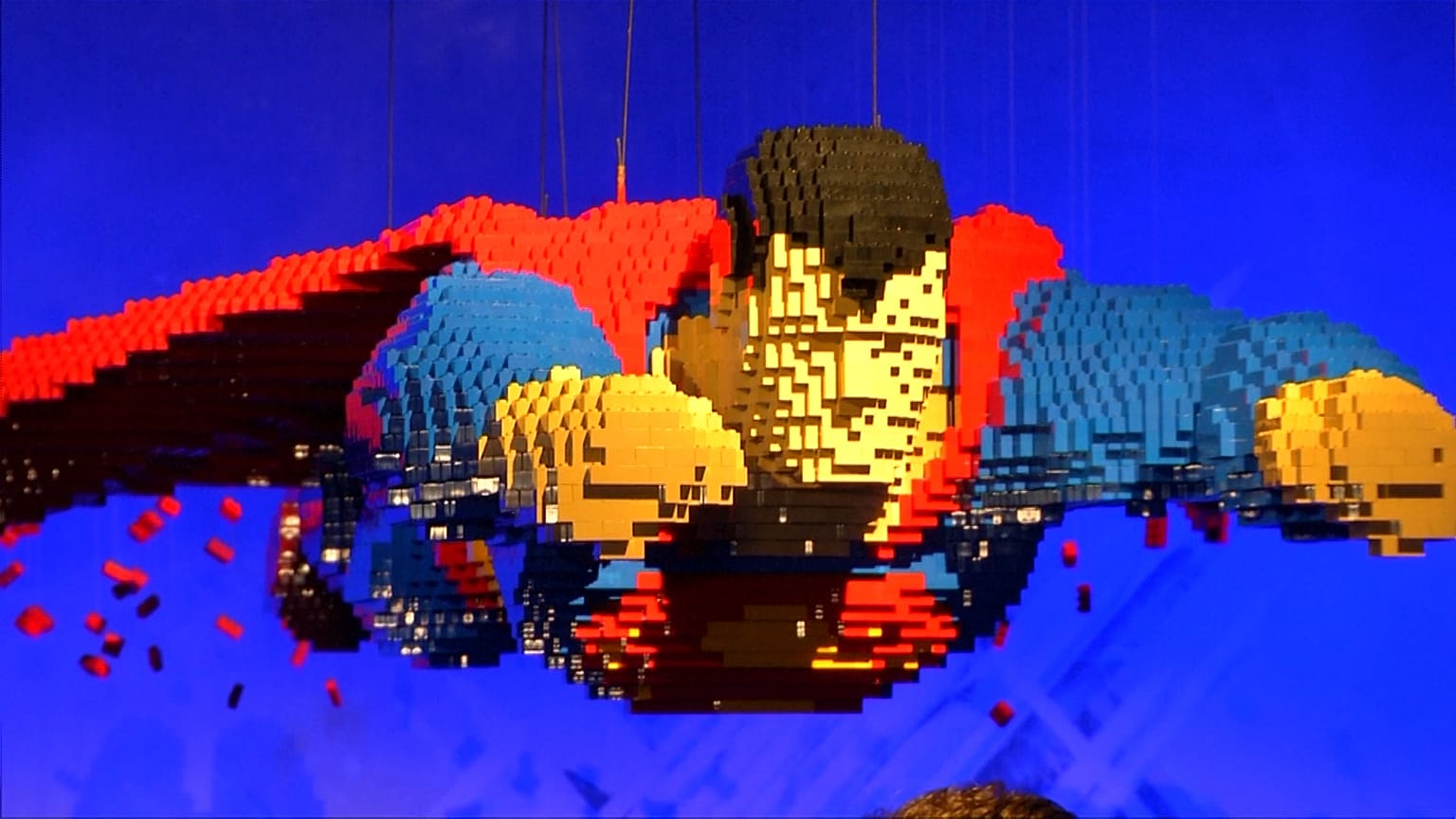 artist builds superheroes out of more than 2 million bricks