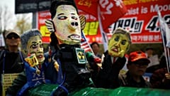 Caricaturas e cartazes contra Pyonyang num protesto em Paju