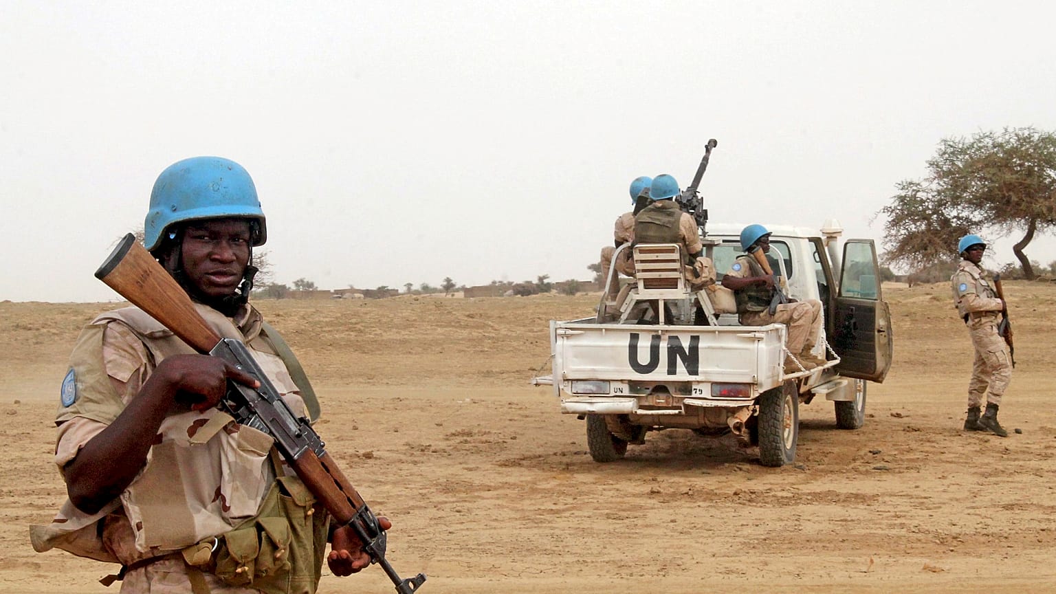 FILE PHOTO: UN peacekeepers stand guard in Kouroume, Mali, in May, 2015.
