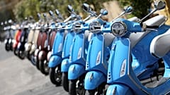 Vespa Primavera scooters parked