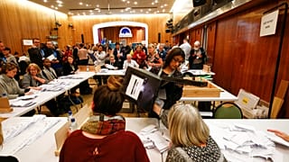 Volunteers count ballot papers in Wandsworth, London, May 3, 2018