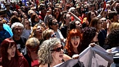 Protesters decry verdict in Pamplona's Wolf Pack case.