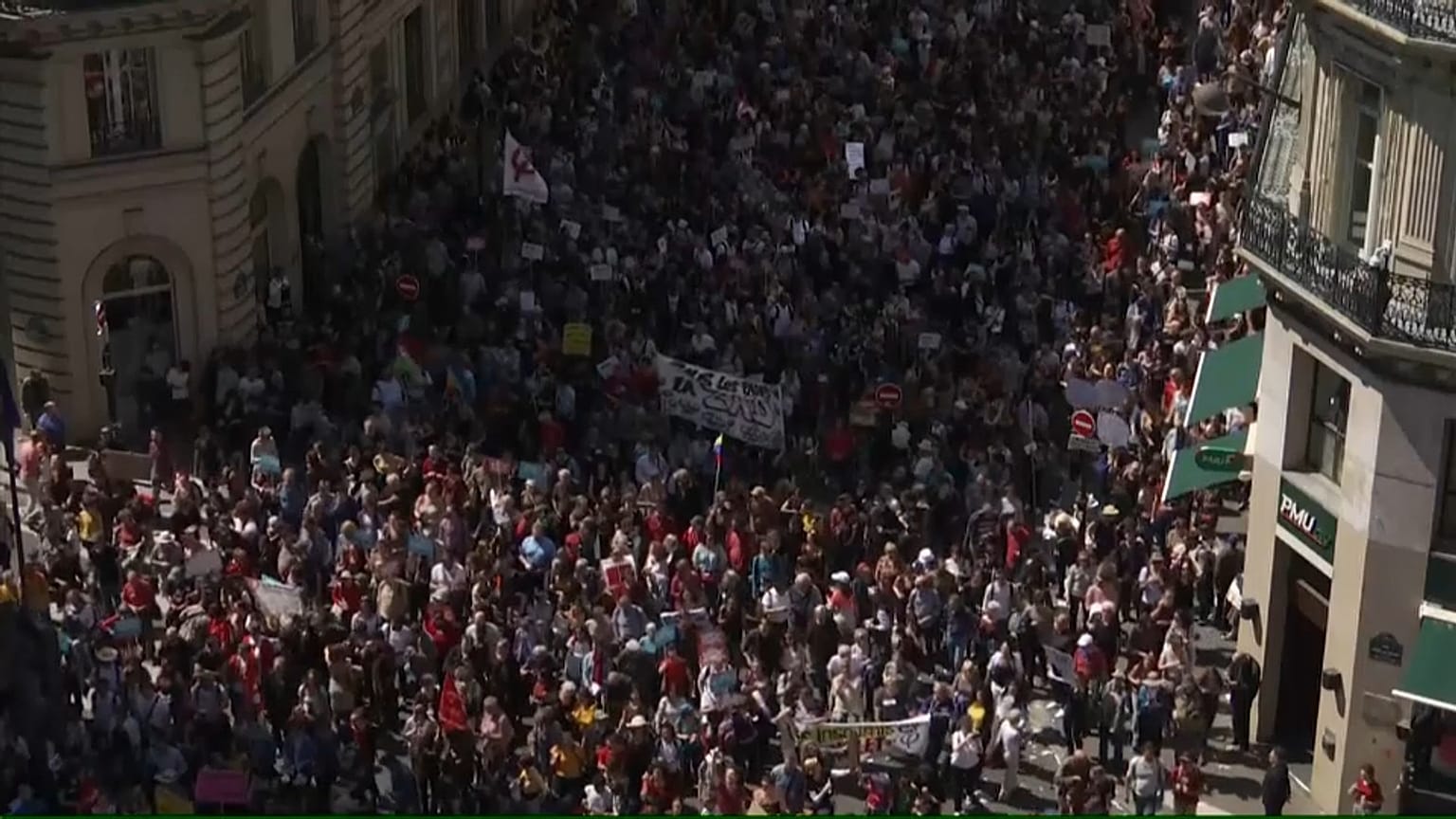 Tens of thousands protest in Paris against President Macron's economic reforms
