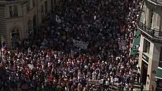 Tens of thousands protest in Paris against President Macron's economic reforms