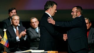 Colombian President Juan Manuel Santos and FARC leader Rodrigo Londono