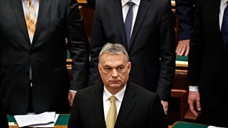Hungarian Prime Minister Viktor Orban looks on before taking the oath of of