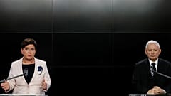 Polish MPs vote to cut their own pay after bonus scandal