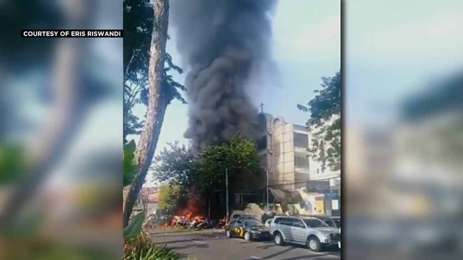 Suicide bombers kills at least a dozen in attacks on churches in Indonesia