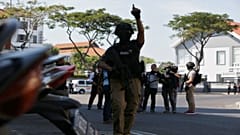 a bomb blast at police office in Surabaya