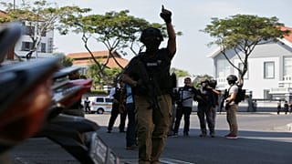 a bomb blast at police office in Surabaya