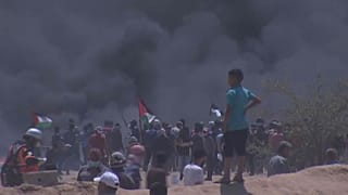 Gazans burn tyres in the hope smoke will protect them from Israeli snipers.