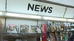 rush to gather UK newspapers commemorating royal wedding
