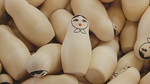 Iconic Russian matrioshka dolls painted with World Cup symbols