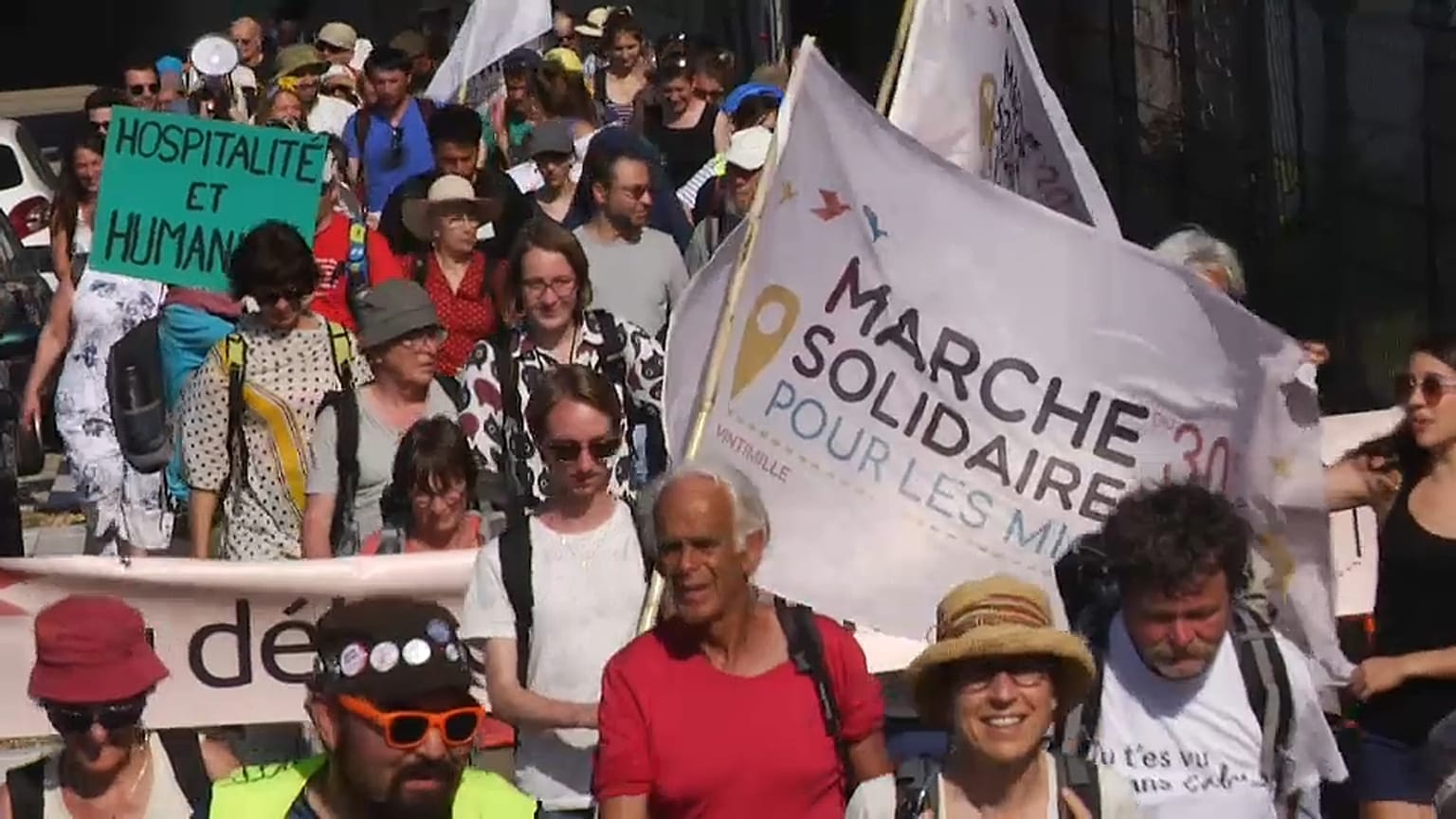 Marcher pour les migrants