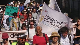 Marcher pour les migrants