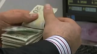 La caída de la lira pone en aprietos a Erdogan