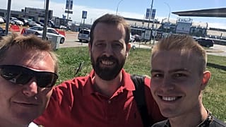 Kristofer Arnar Einarsson standing with his host (on the left) levgen Smyrn