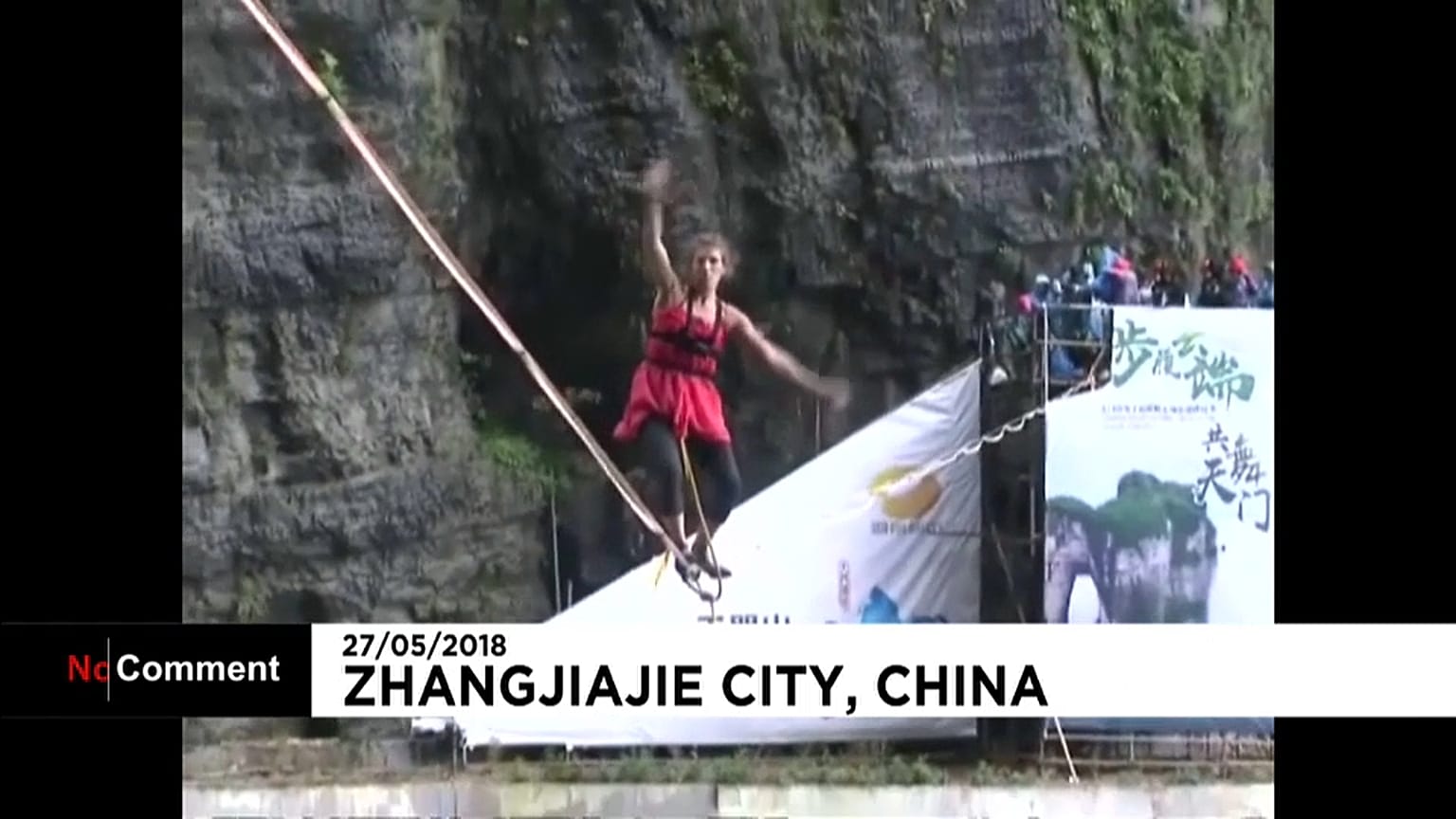 A woman walks a highwire in high-heels
