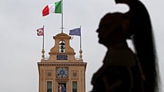 Italian military officer stands guard inside the Presidential Palace