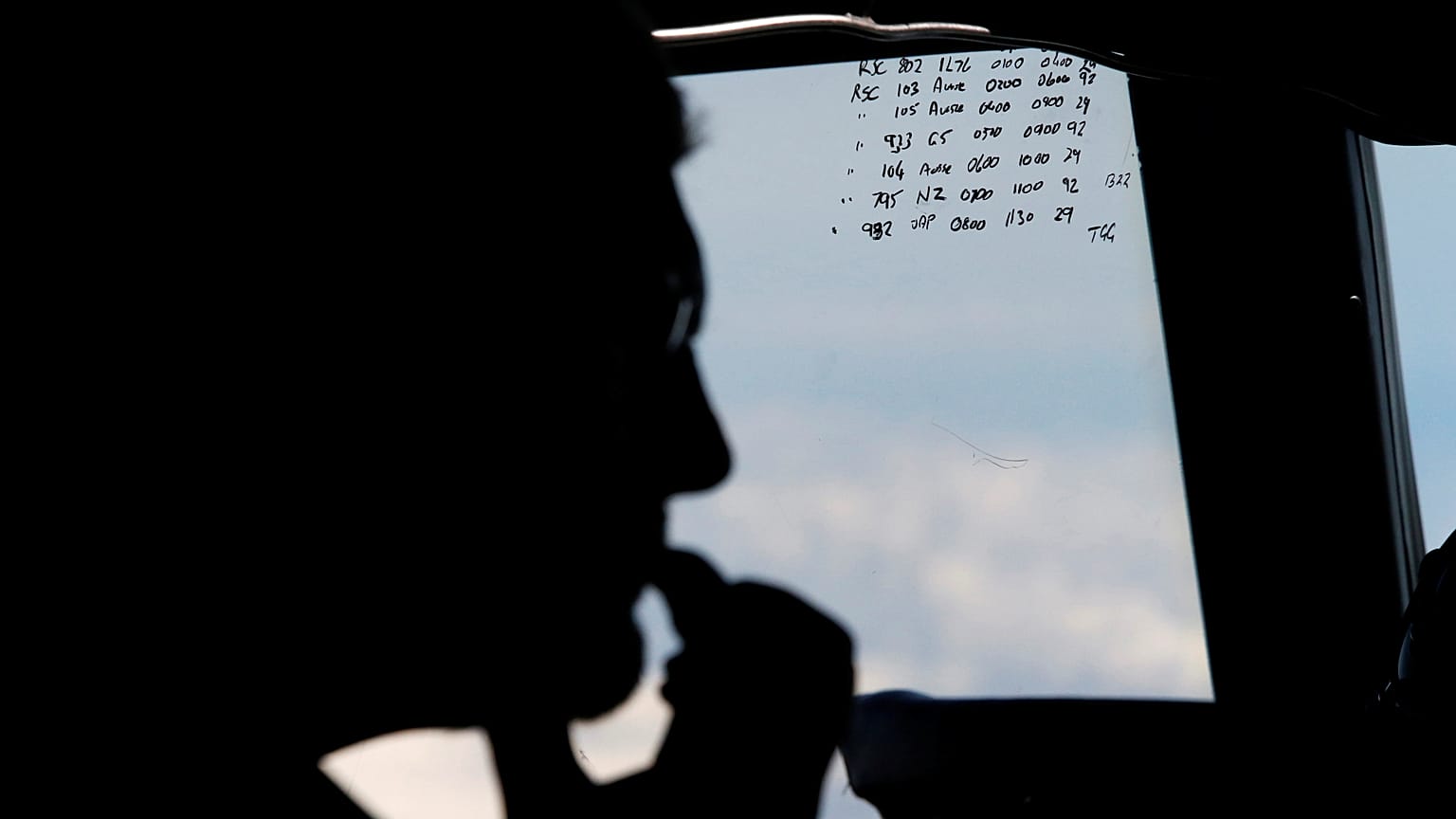  A crew member aboard a Royal New Zealand Air Force P-3K2 Orion aircraft is