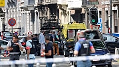 Polizisten am Ort des Attentats in Lüttich